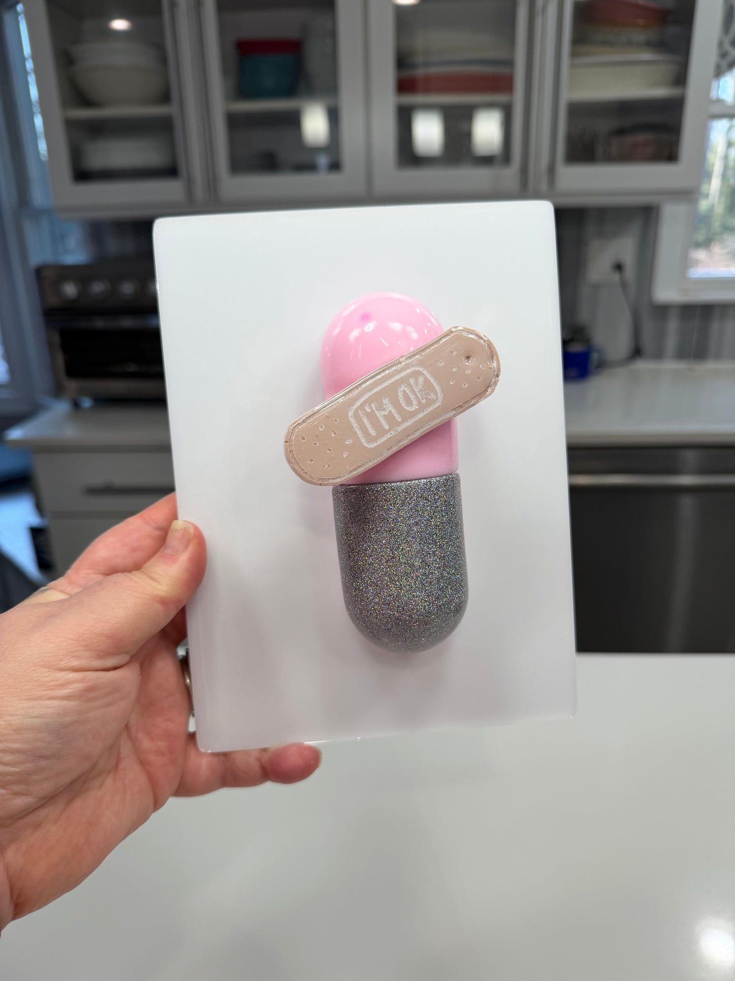 I’m Ok Capsule Pill Wall Art – 8x6” Resin Sculpture – Pink Pop Art Mental Health Piece – Glitter Silver & Bandage Detail – Ready to Hang