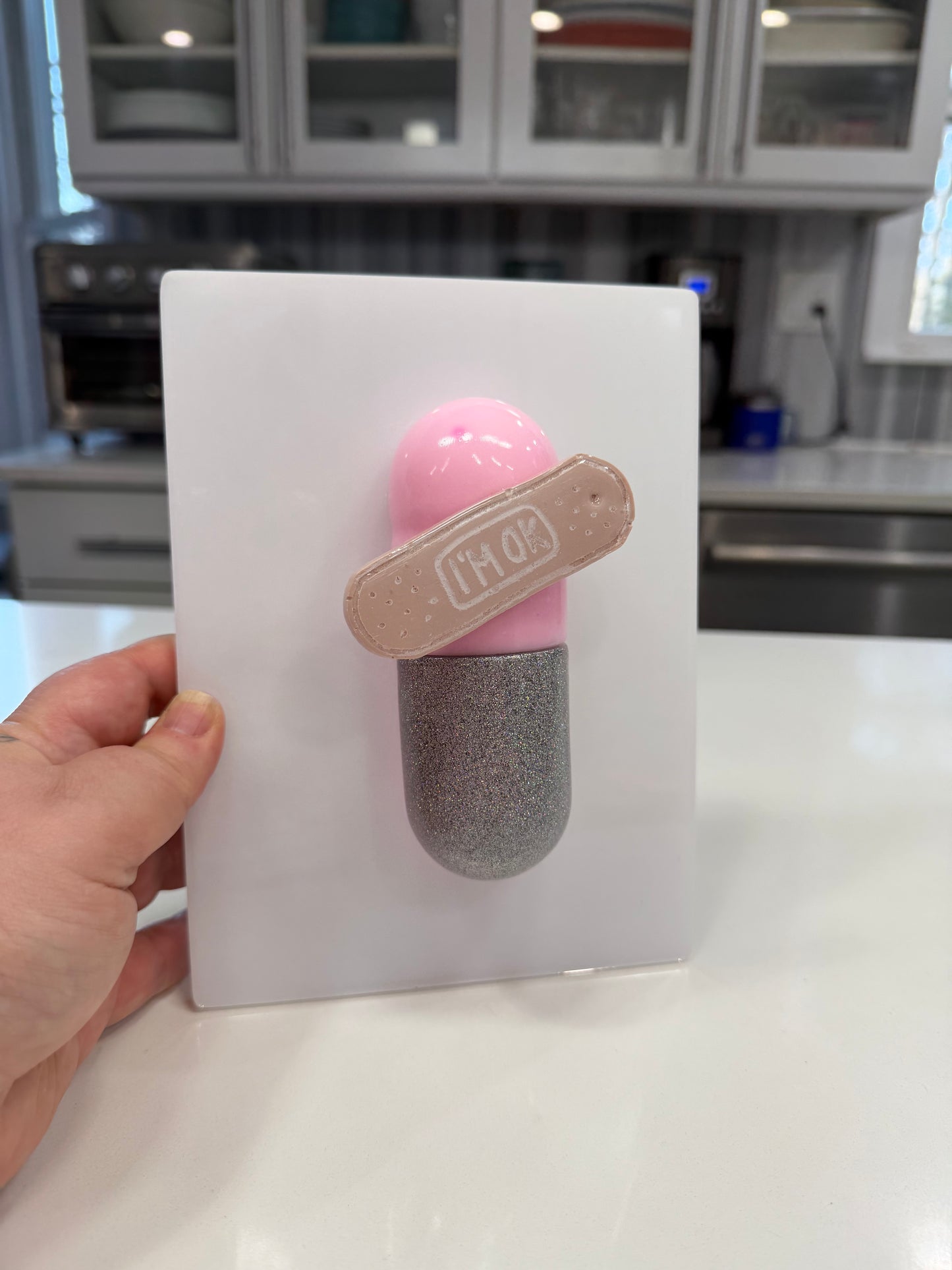 I’m Ok Capsule Pill Wall Art – 8x6” Resin Sculpture – Pink Pop Art Mental Health Piece – Glitter Silver & Bandage Detail – Ready to Hang