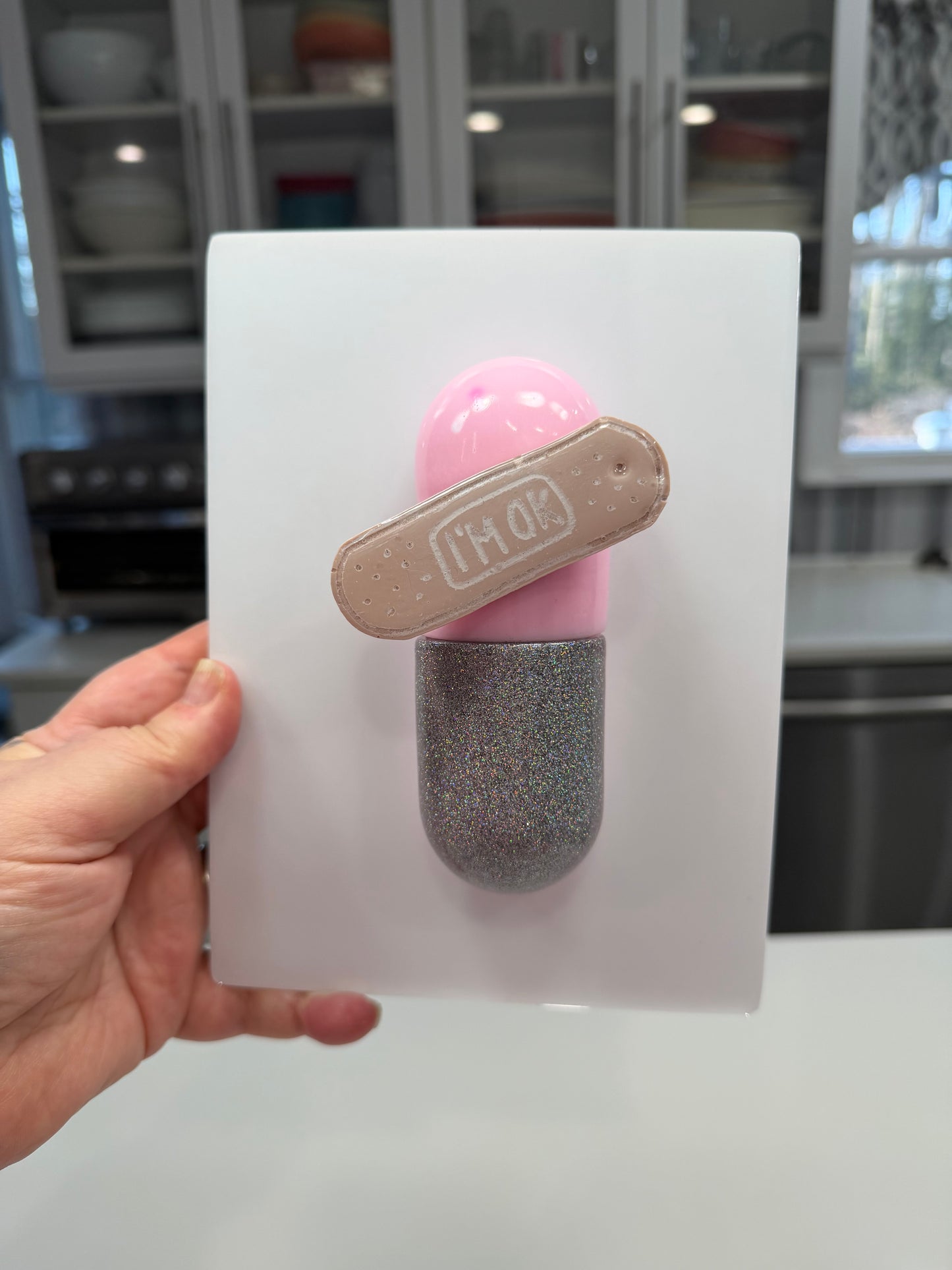 I’m Ok Capsule Pill Wall Art – 8x6” Resin Sculpture – Pink Pop Art Mental Health Piece – Glitter Silver & Bandage Detail – Ready to Hang