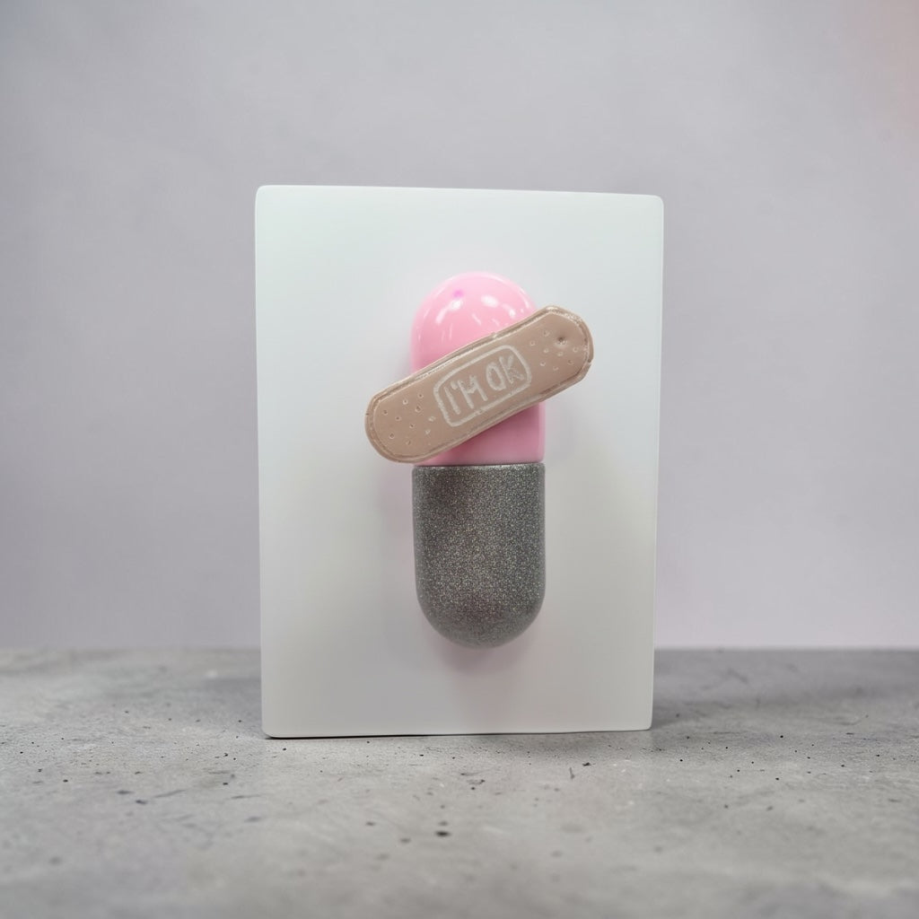 I’m Ok Capsule Pill Wall Art – 8x6” Resin Sculpture – Pink Pop Art Mental Health Piece – Glitter Silver & Bandage Detail – Ready to Hang