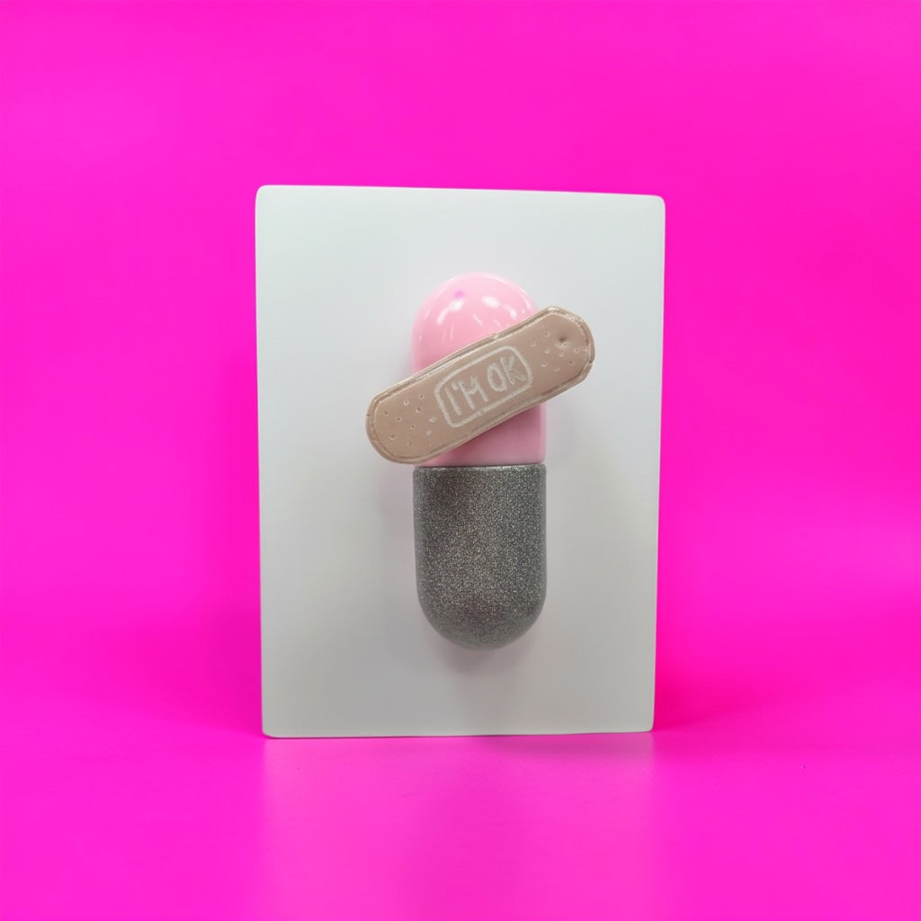 I’m Ok Capsule Pill Wall Art – 8x6” Resin Sculpture – Pink Pop Art Mental Health Piece – Glitter Silver & Bandage Detail – Ready to Hang