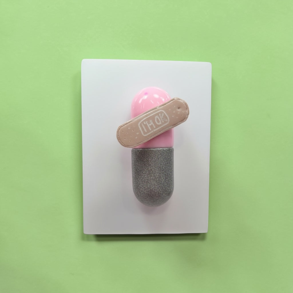 I’m Ok Capsule Pill Wall Art – 8x6” Resin Sculpture – Pink Pop Art Mental Health Piece – Glitter Silver & Bandage Detail – Ready to Hang